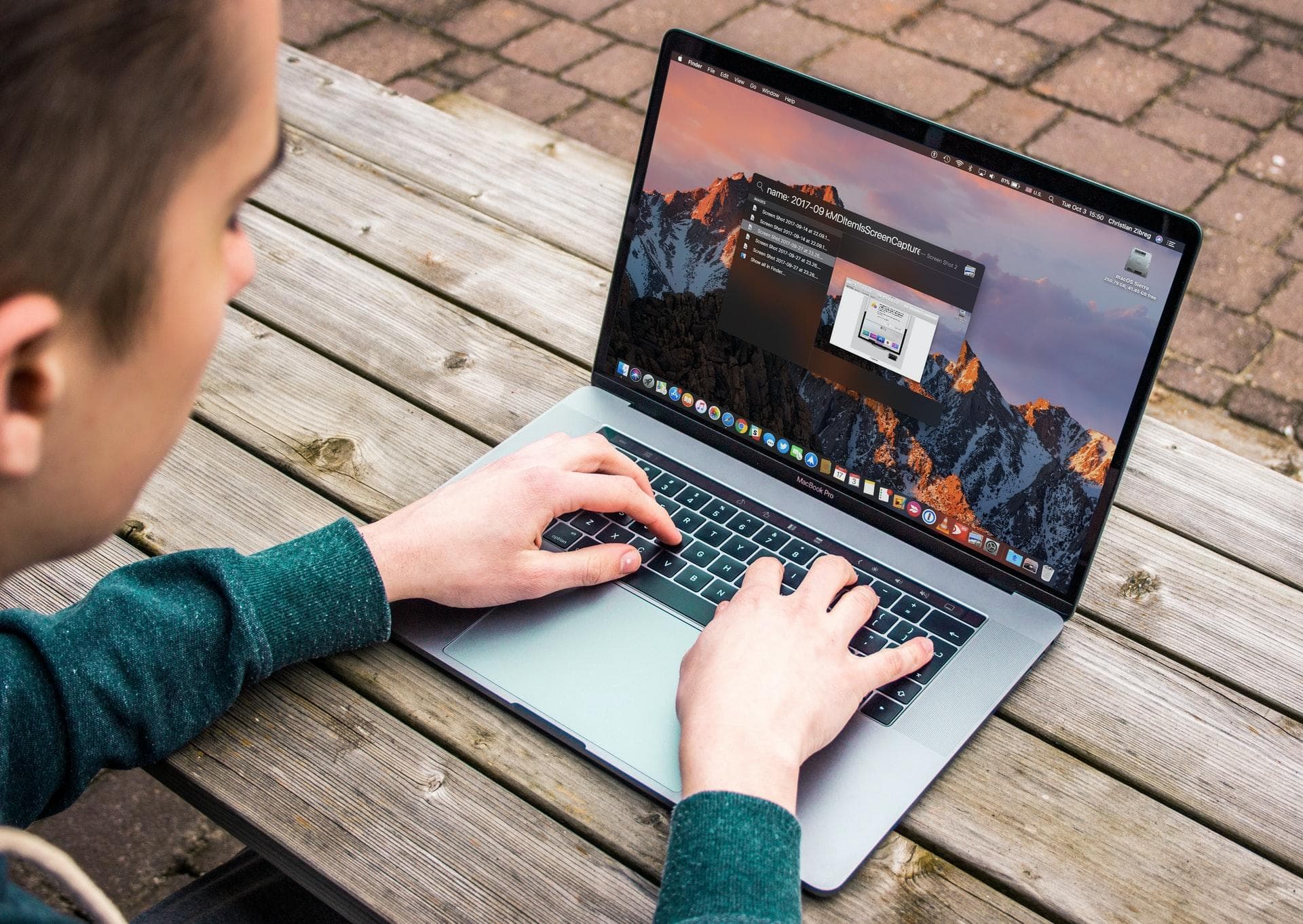 Man typing on MacBook Pro
